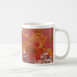 A queda colore a caneca