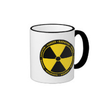 Caneca amarela do símbolo da radiação