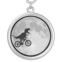 Dinossauro em uma lua da bicicleta colares