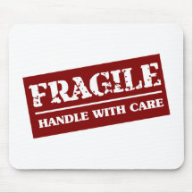 Do punho artigo frágil com cuidado mousepad