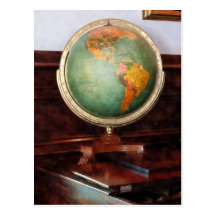 Globo no piano cartão postal