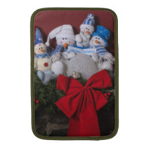 Grinalda do Natal da família do boneco de neve Bolsa De MacBook