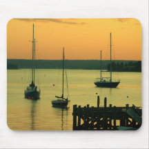 Iate no por do sol mouse pads