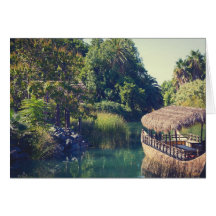 Paisagem tropical com um barco cartões