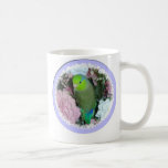 Parrotlet masculino verde com flores canecas