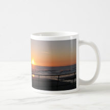 Por do sol na costa caneca
