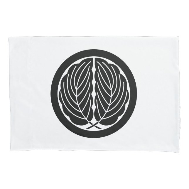 丸に抱き柏 (Frente)