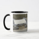 Pesquisar por transportador canecas Em movimento