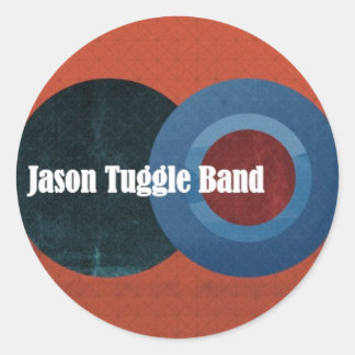 A banda de Jason Tuggle circunda a etiqueta