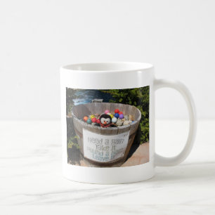 A caneca de café de colocação do pinguim