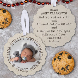 A primeira safra de Natal do bebê adiciona sua fot