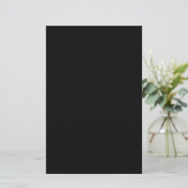 A solid black textured surface fills the entire