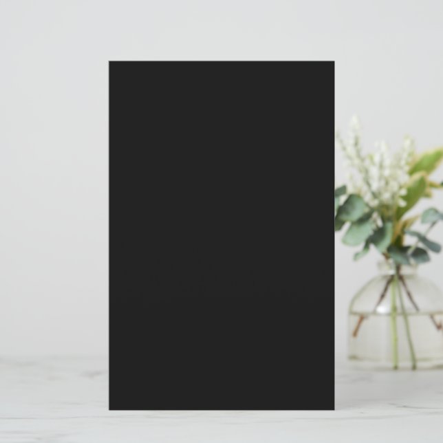 A solid black textured surface fills the entire (Em pé/Frente)
