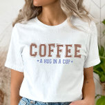 Abraço em uma camisa de taça, Camisa de café engra<br><div class="desc">Apresentando nossa camisa "Café, um abraço em uma xícara" - a escolha perfeita para amantes de café em todos os lugares. Esta na moda e camisa confortável apresenta um design divertido e moderno que certamente fará uma declaração. Feito com material de alta qualidade, esta camisa é macia e durável, fazer...</div>