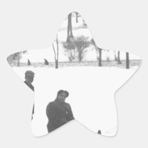 Adesito Estrela Dois meninos que puxam duas meninas em trenós