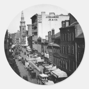 Adesivo 1859: Tráfego e compras na Rua Washington