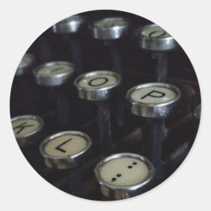 Adesivo A máquina de escrever do vintage fecha em volta d