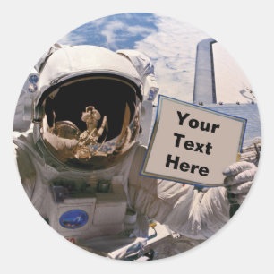 Adesivo Astronauta da NASA segurando placa - Adicionar tex