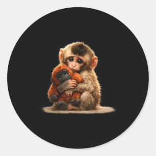 Adesivo Bebê macaco abraçando bichinho de pelúcia fofo mac