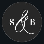 Adesivo Black Whimsical Calligraphy Wedding Monogram<br><div class="desc">Add a charming finishing touch to your wedding stationery or favors with this wedding sticker featuring a whimsical calligraphy ampersand. Designed with a romantic yet modern flair, this sticker is perfect for sealing envelopes, decorating favor boxes, or adding a personalized detail to welcome bags and more. The hand-drawn ampersand adds...</div>