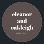 Adesivo Bold Typography Warm Brown Modern Custom Wedding<br><div class="desc">This round wedding sticker in brown features clean serif typography with the couple’s names and date on a rich neutral background. A simple,  modern option for sealing envelopes,  favors,  or packaging on your wedding day. Personalize the names and date to match your celebration.</div>