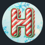 Adesivo Candy Cane Christmas Sticker "H", Stripes Festivas<br><div class="desc">Adicione um toque festivo aos seus presentes de férias e decoração com estes adesivos redondos com a letra "H" num design de cana doce alegre. Perfeito para personalizar presentes, cartas e favoritos para festas! Personalize esta design com um monograma, nome ou foto. © Copyright 2024 P.D., Padrões e pinturas de...</div>