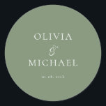 Adesivo Chic Script Sage Green Minimalist Wedding<br><div class="desc">Add a personal and elegant touch to your wedding favors, envelopes, or packaging with this minimalist round sticker featuring your custom name in a graceful script font. Designed to complement a modern and timeless wedding theme, this classic Sage Green and white design pairs beautifully with any part of your celebration....</div>