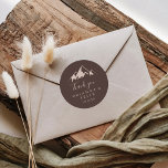 Adesivo Clear Mountain Country Obrigado Favor do Casamento<br><div class="desc">Este obrigado de serra que você fez o favor ao casamento... O adesivo comum é perfeito para um casamento rústico. O design apresenta uma coloração aquática idílica, montanha bege. Faça com que a etiqueta do adesivo seja sua, incluindo seus nomes, o evento (se aplicável) e a data. Esses adesivos podem...</div>