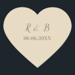 Adesivo Coração Casamento Bonito e Clássico<br><div class="desc">Complemente sua papelaria de casamento com a aula usando esses adesivos de forma cardíaca. Eles apresentam um fundo bege com texto escrito em caracteres castanhos adoráveis. Personalize seu nome e data do casamento também em caracteres castanhos. Peça seus adesivos de casamento hoje! Design do Sticker: WeddingsbyRhoadie</div>