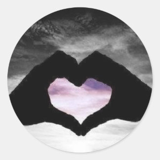 Adesivo coração na mão