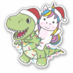 Adesivo Dinossauro de Natal Unicorn Winter T-Rex Dino Stic<br><div class="desc">O T-Rex com natal unicórnio com luzes de fadas. Um unicórnio engraçado caminha no dinossauro para as férias. Também é engraçado para o Natal em julho. Dinos são animais bonitos e perfeitos para o Natal.</div>