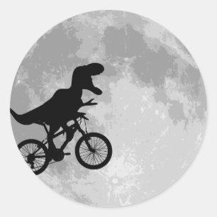 Adesivo Dinossauro numa bicicleta com lua