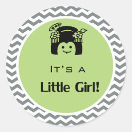 Adesivo É uma menina verde, cinza com adesivos.