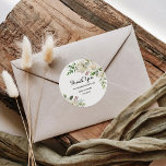 Adesivo Elegant Winter White Peony Obrigado Favor<br><div class="desc">Esse elegante obrigado de peônia branca de inverno que você privilegia os adesivos redondos clássicos são perfeitos para um casamento de destino. A design apresenta um buquê de folhas,  pintadas à mão,  arrojadas,  verdes e marrons,  com peonias brancas com aspecto fresco,  inspiradora felicidade e beleza natural.</div>