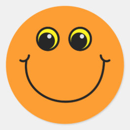 Adesivo Emoji alaranjado de sorriso enfrenta