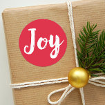 Adesivo Feriado de Script de Joy Red Brushing<br><div class="desc">Os autocolantes de Feriado apresentam o texto branco do script "Joy" com um fundo vermelho festivo (pode ser personalizado).</div>