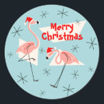 Adesivo Flamingo Santas Blue Merry Christmas sticker round<br><div class="desc">Um design de Natal animado e esquisito com um toque retrorreflector com flamingos cor-de-rosa vestindo um chapéu de Santa, formas geométricas de creme e estrelas em um fundo azul (mudança de cor). Um design personalizável para você personalizar com seu próprio texto, imagens e ideias. Uma imagem de arte digital original...</div>