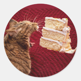 Adesivo Gato Engraçado comendo um pedaço grande de bolo