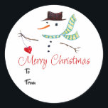 Adesivo Gift Label Christmas Art Snowman Com Coração<br><div class="desc">Um adesivo de etiqueta de presente de arte de boné de neve. Desenhado à mão com caneta e lápis com texto e espaço para adição de nomes (de e para) "Feliz Natal". Este boneco de neve invisível segura um coração numa corda.</div>