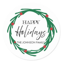 Happy Holidays with green wreath and red berries