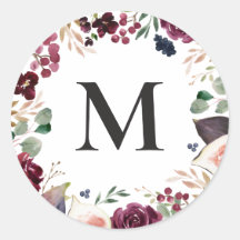 Inicial floral em aquarela roxa e rosa