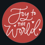 Adesivo Joy To The World Lettering Red Christmas<br><div class="desc">Alegria ao mundo,  o Senhor vem! Adicione um sotaque festivo aos seus envelopes,  cartões e presentes com este adesivo de férias. Apresenta caligrafia moderna com fundo vermelho. Este adesivo de Natal é perfeito como um selo de envelope e para embalagem de presente.</div>