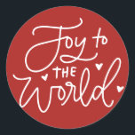 Adesivo Joy To The World Lettering Red Christmas<br><div class="desc">Alegria ao mundo,  o Senhor vem! Adicione um sotaque festivo aos seus envelopes,  cartões e presentes com este adesivo de férias. Apresenta caligrafia moderna com fundo vermelho. Este adesivo de Natal é perfeito como um selo de envelope e para embalagem de presente.</div>