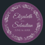 Adesivo Lacy Silver Filigree Elegant Plum Purple Wedding<br><div class="desc">These elegant wedding stickers feature fancy pale gray script text on a plum purple background with a lacy silver faux foil floral border. The text is fully customizable and contains the wedding couple's names and wedding date. Great as favor tags or envelope seals!</div>