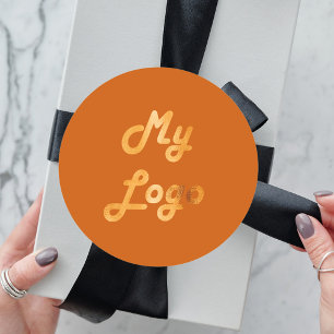 Adesivo Logotipo comercial do ouro laranja queimado