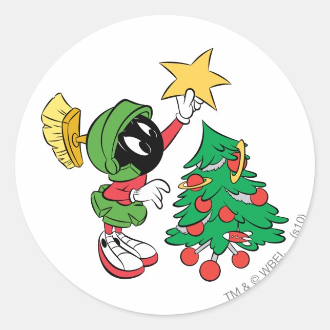 Adesivo MARVIN THE MARTIAN™ colocando estrela na árvore (Frente)