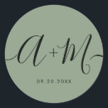 Adesivo Minimalist Monogram Script Custom green Wedding<br><div class="desc">Elevate your wedding details with the Minimalist Monogram Script Custom Wedding Date green Sticker. This elegant and personalized sticker adds a touch of sophistication to your wedding stationery, allowing you to showcase your monogram and wedding date in a simple yet impactful way. The sticker features a minimalist script design that...</div>