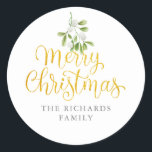 Adesivo MistletoDourado Script Merry Christmas Family Name<br><div class="desc">Bonito melodia embebida em água sobre o guião de ouro cômico...  a tipografia de Natal Merry nesses adesivos elegantes. Personalize com seu nome de família. Projetado por Thisnotme©</div>
