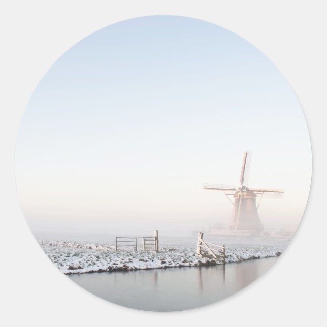 Adesivo Moinho de vento na neve com vinheta redonda de inv (Frente)