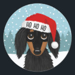 Adesivo Natal para Papais noeis de Tan Dachshund<br><div class="desc">Espalhe a alegria de férias com este adorável adesivo de Natal! O adesivo apresenta um dachshund preto e bronzeado, ilustrado, vestindo um chapéu vermelho brilhante de Papai Noel, com forma branca. HO HO HO pode ser personalizado com nome ou outro texto. Estes autocolantes podem ser utilizados para selar envelopes ou...</div>